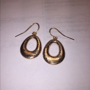 Genuine 14k rose gold textured earrings.